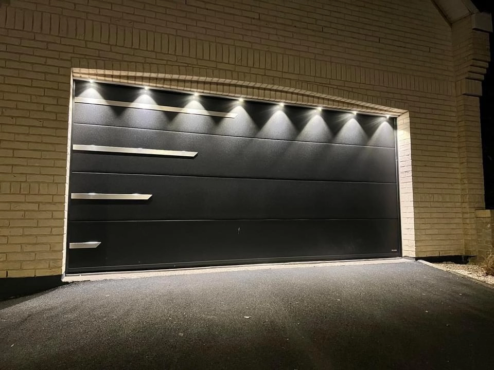Installation de porte de garage sectionnelle