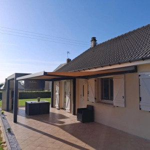 Mise en place d'un store banne avec pergola en Normandie
