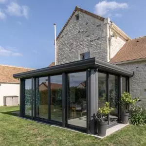 une superbe extension de sa maison avec une veranda lumineuse