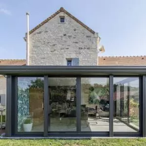 une superbe extension de sa maison avec une veranda lumineuse