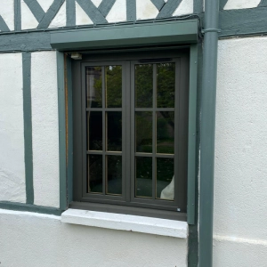 Installation de fenêtres en alu/bois à Thiberville 