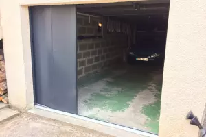 Installation d'une porte de garage latérale à Caen 