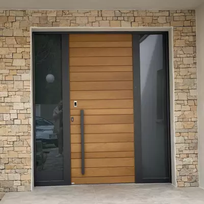 Pose d'une porte d'entrée en bois et aluminium à Rouen