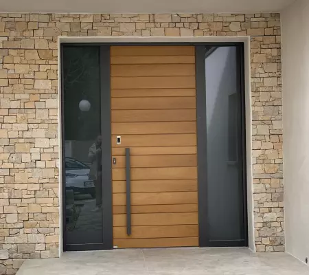 Pose d'une porte d'entrée en bois et aluminium à Rouen