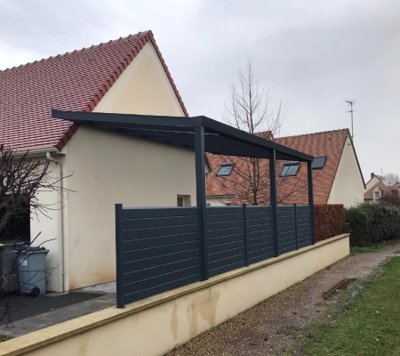 Pose d’un carport Gardendreams par l’agence de Fleury sur Orne