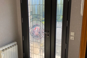 Pose d’une porte d’entrée Bel’m dans la manche 