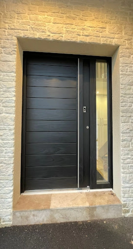 Installation d'une porte Bel’M en bois motorisée à Caen en Normandie